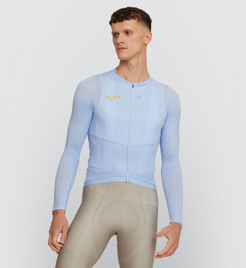 Front view of cyclist in Sky Long Sleeve Air Jersey: Sleek fit with advanced ventilation features