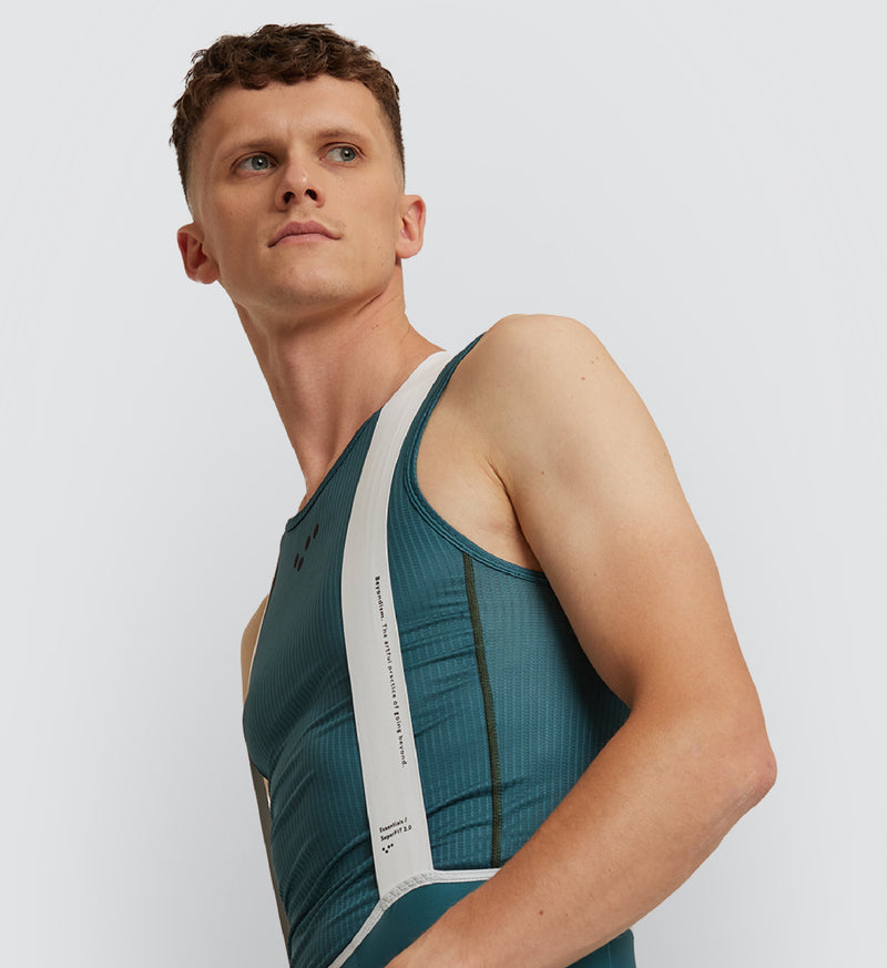 Front view of cyclist wearing Evergreen Air Base Layer, showcasing breathable fabric and comfort design