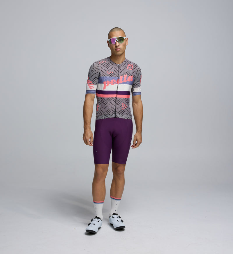 Front view of cyclist wearing the RideKnit Classic Jersey – form-fitting design with extended sleeves and low-cut collar
