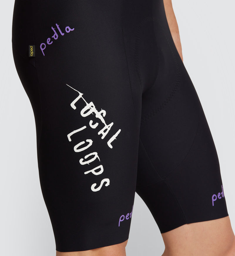 Close-up view of LOCAL LOOPS Men's SuperFIT 2.0 Cycling Bib Shorts in Club Team on model, detailing the advanced Italian fabric construction, seamless cuffs, and Elastic Interface® chamois for superior comfort, muscle support, and performance on every ride.