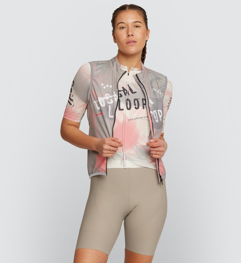 Front view of model wearing LOCAL LOOPS Women's Classic Cycling Gilet in Club Stone, showcasing the lightweight wind-resistant design with a two-way water-resistant YKK zipper and ergonomic fit for all-weather comfort during cycling.