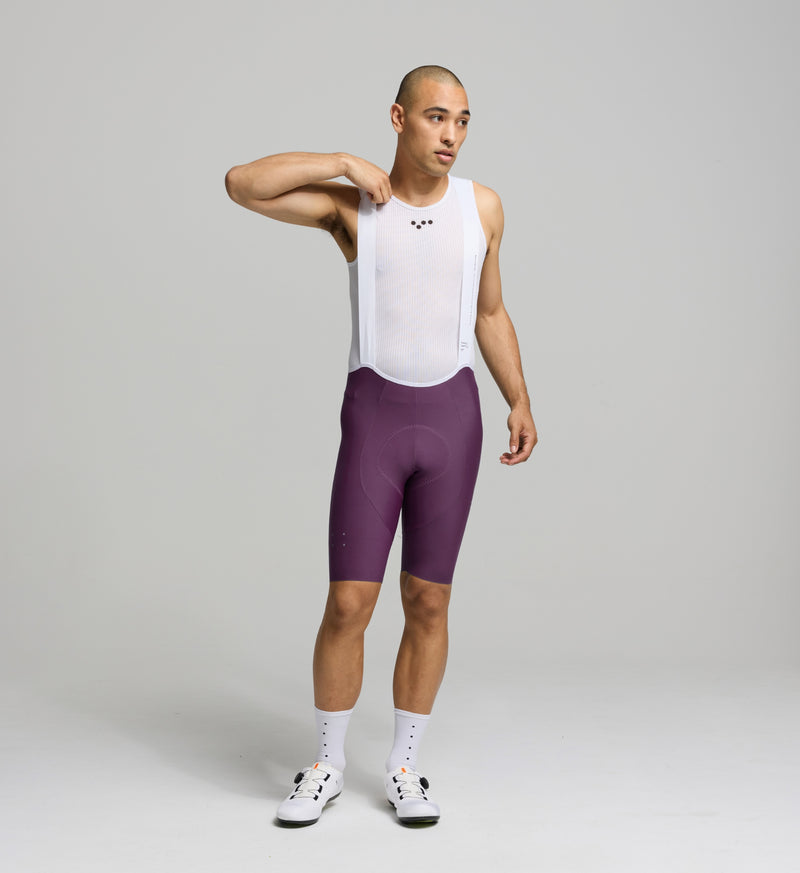 Men's SuperFIT 2.0 Cycling Bib Shorts showcasing a streamlined fit, seamless cuff, and reflective detailing for enhanced visibility.