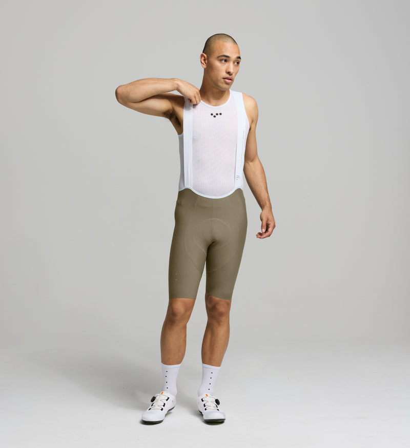 Men's SuperFIT 2.0 Cycling Bib Shorts showcasing an aerodynamic fit, seamless cuff, and reflective detailing for enhanced visibility.