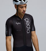 Macro detail of the WOVEN Grid main fabric and Italian high-density chamois in the Men's Pro Pursuit Crit Suit – Black, showcasing advanced texture for breathability, drag reduction, and long-ride comfort.