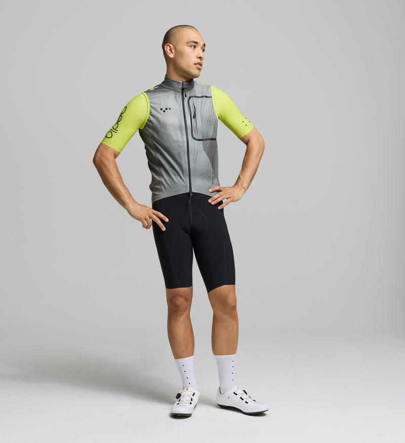 Cyclist wearing waterproof & windproof Pro Deflect 2.0 Gilet with a high collar for extra protection.