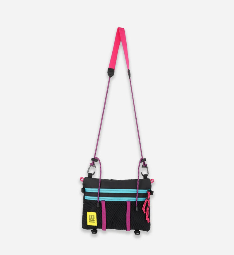 Topo Designs Black/Grape Mountain Accessory Shoulder Bag alone, featuring YKK zippers and multiple pockets.
