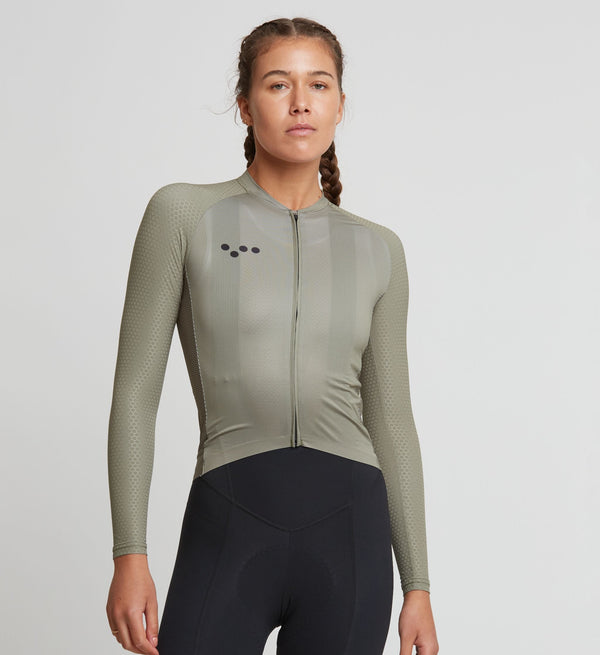 Pro Women's Pursuit LS Cycling Jersey - Khaki. Aerodynamic, sun-protective, race-ready fit. Italian fabrics. Reflective accents. 3x rear pockets.