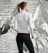 Elevate Women's Elements Thermal LS Cycling Jersey - Off White: Warm, comfortable, and stylish for cold weather rides.