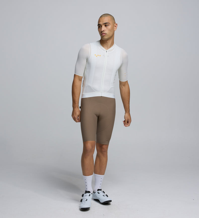 Front view of cyclist wearing Porcelain Ray Air Jersey – breathable mesh chest and sleeves for airflow and cooling on high-summer rides