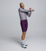 Side profile of Men's Light Grey Classic Cycling Jacket – showcasing mesh ventilation panels and two-way zipper for airflow control
