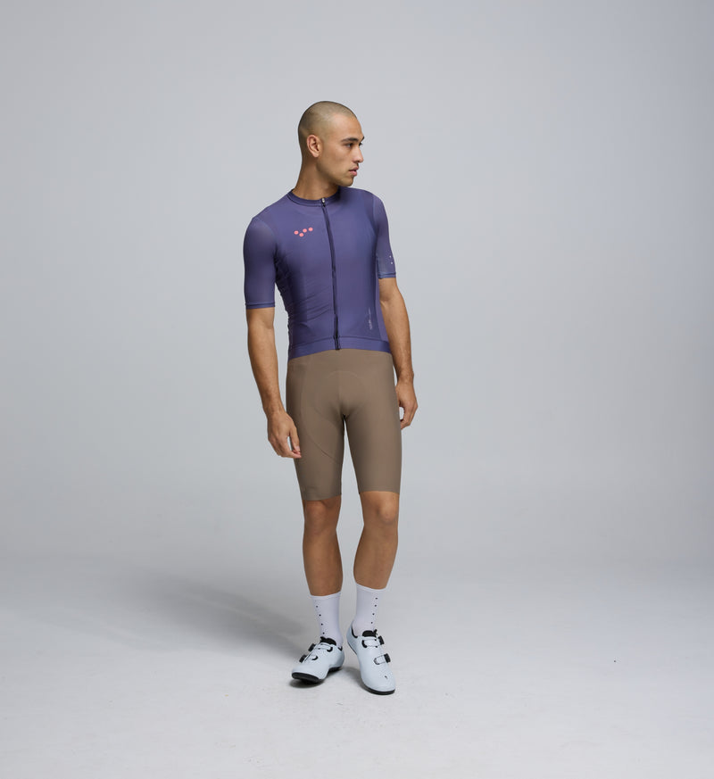 Front view of cyclist in Dusk Classic Jersey – extended sleeves, low-cut collar, and breathable design for comfort in all conditions