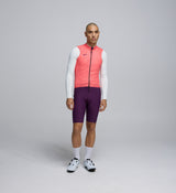 Front view of cyclist wearing Coral Plum Classic LITE Gilet – windproof, water-resistant front and reflective detailing for all rides