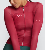 Close-up of Women's Raspberry Air Long Sleeve Cycling Jersey - Laser-cut collar and seamless stretch sleeve finish.