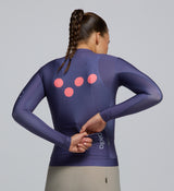 Close-up of SPF 50-rated fabric and silicone hem gripper – moisture-wicking and sun-protective details for all-season riding comfort