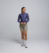 Front view of female cyclist in Dusk Classic LS Jersey – extended sleeves and contoured fit for cool-weather cycling comfort