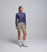 Front view of female cyclist wearing Dusk Classic Long Sleeve Cycling Jersey – form-fitting cut with extended sleeves for comfort and coverage