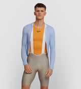 Front view of cyclist wearing Men's Marigold Air Base Layer: Enhanced breathability and fit
