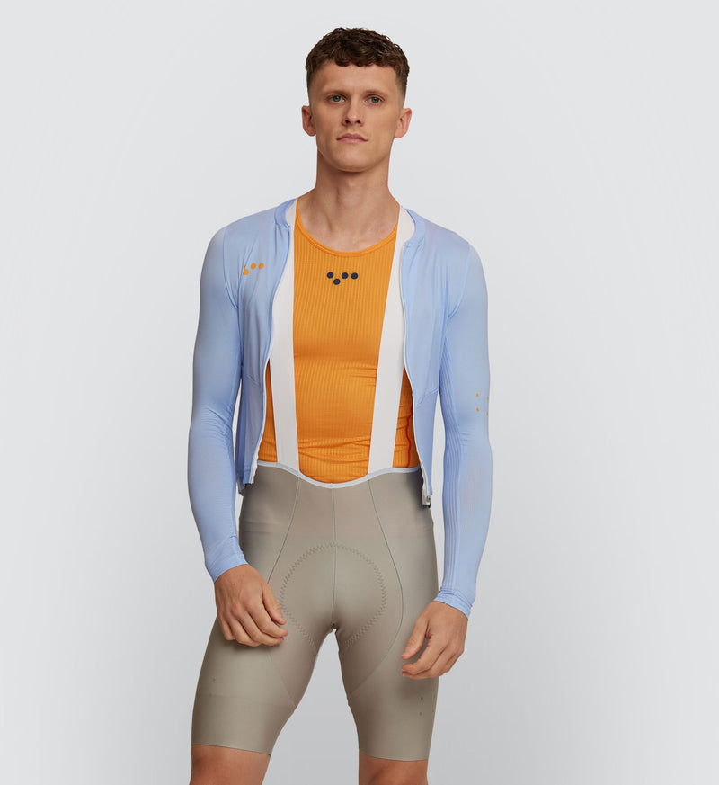 Front view of cyclist wearing Men's Marigold Air Base Layer: Enhanced breathability and fit