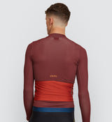 Back view of Rust Midweight Cycling Jersey featuring reinforced back pockets and reflective highlights for safety