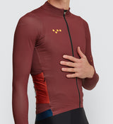 Close-up of the Rust Midweight Long Sleeve Jersey showing YKK Vislon® zipper and high collar for extra warmth