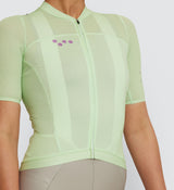 Close-up of Wasabi Women's Air Jersey detailing YKK zipper and stitch-free sleeve bonding for comfort and style