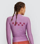 Back view of the Classic Long Sleeve Cycling Jersey in Mauve, emphasizing the flattering fit with silicone gripper bands