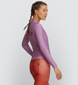 Side view of Women's Classic Long Sleeve Cycling Jersey in Mauve, highlighting underarm and side body ventilation for cooling