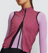 Close-up of the Women's Rose Thermal Cycling Gilet detailing the YKK two-way Vislon® zipper and high stand collar for extra warmth