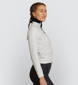 Side view of Women's Chalk Thermal Jacket with stretch fabric and hem gripper for a comfortable, ride-up free fit