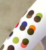 Close-up of the white long sleeve cycling jersey fabric, showcasing four-way stretch, breathable SPF 50 material, and precision craftsmanship.