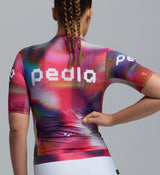 Pedla Colour Wheel Women's Classic Jersey Motion Pink - Designed as your go-to cycling jersey for any ride, the Classic Cycling Jersey combines performance, comfort, and style in one essential piece. Whether you're riding long distances or enjoying a casual bike ride, this jersey offers a perfect fit and reliable performance in all conditions.