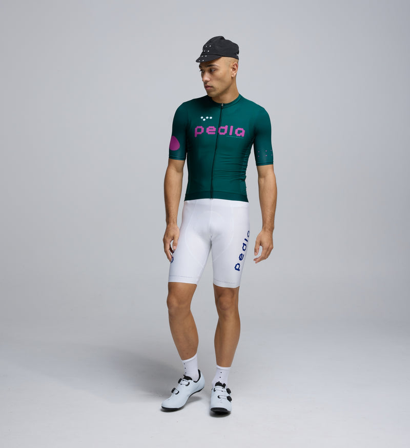 Front view of Pedla’s Men’s Classic Jersey in Pine highlighting sleek fit, low-cut collar, and moisture-wicking properties