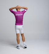 Rear view of Pedla’s Men’s Climba Cycling Jersey in Violet with reinforced rear pockets and silicon-injected hemline band