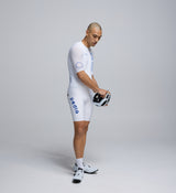 Side view of Men’s LunaAir Jersey in White with extended sleeves, low-cut collar, and premium breathable design