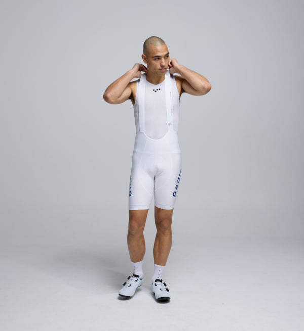 Front view of Pedla’s Men’s SuperFIT 2.0 Bib Short in White showcasing aerodynamic design and bonded finishes