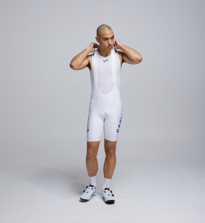 Front view of Pedla’s Men’s SuperFIT 2.0 Bib Short in White showcasing aerodynamic design and bonded finishes