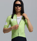 Close-up of men's lime Glow Dots Air Jersey cycling jersey with breathable mesh panels, moisture-wicking fabric, zip-front performance fit, 3 rear pockets, UPF 15+ sun protection for hot-weather road riding