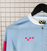 Men's Air long-sleeve cycling jersey, blue gradient with pink dot logo, lightweight zip-front road jersey with breathable mesh panels, moisture-wicking fabric and UPF 15+ sun protection for warm-weather rides
