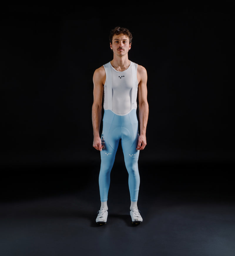 Men's SuperFIT 2.0 powder blue cycling bib tights, Pedla long bibs with Elastic Interface chamois, Italian breathable fabric, aerodynamic fit, reflective logos, enhanced muscle support and comfort