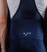 Men's SuperFLEECE 2.0 black thermal cycling bib tights with Italian Roubaix fleece, lightweight brace, perforated breathable back panel, reflective leg logos and Elastic Interface Carbonium chamois for winter rides