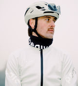 Close-up of men's porcelain thermal cycling jacket on cyclist with helmet and sunglasses — windproof, water-resistant thermal knit, SAB two-way waterproof zipper, reflective details, hem gripper, concealed rear pocket for winter commuting.