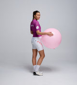 Side view of Women’s Climba Jersey in Violet with extended sleeves, stretch panels, and silicon-injected hemline band