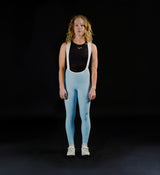 Pedla Women's SuperFIT 2.0 powder blue cycling bib tights with white braces, Elastic Interface chamois, seamless non-stitched cuffs and reflective logos — front view