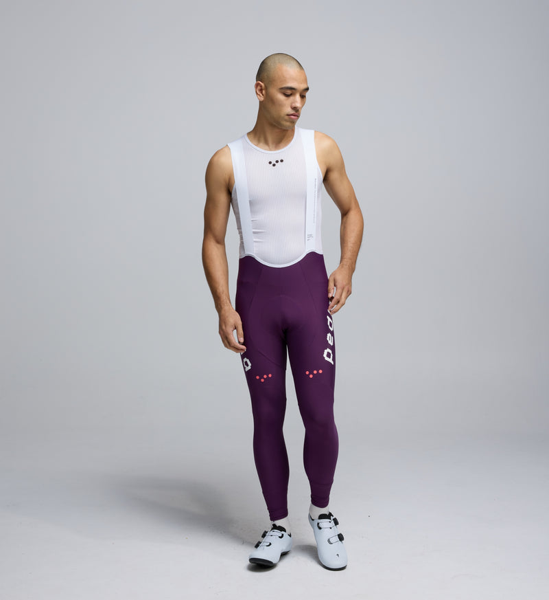 Front view of Pedla’s Men’s SuperFIT 2.0 Bib Tight in Aubergine showcasing sleek aerodynamic fit and high-performance construction