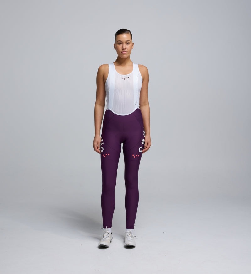 Front view of Pedla’s Women’s SuperFit 2.0 Bib Tight in Aubergine highlighting sleek design and premium construction