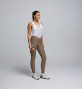 Side view of Women’s SuperFit 2.0 Bib Tight in Stone showing aerodynamic construction and reflective logos