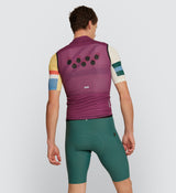 Back view of Classic Gilet in Mulberry on model, best weatherproof, windbreaker vest for year-round cycling.