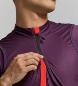 Close-up of recycled aubergine fabric, silicone hem band, and stitching – showcasing technical materials, 2.5CM gripper for secure fit, and lightweight packable design for real-world use.