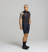 Side view of men’s black cycling vest – slim fit with elasticated armholes, breathable mesh back panel, and flexible cut for layering over jerseys or under jackets.