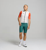 Front view of male cyclist in porcelain Classic LITE Gilet – clean, minimalist fit with wind-blocking front panel and SAB two-way zip for ventilation during training rides.